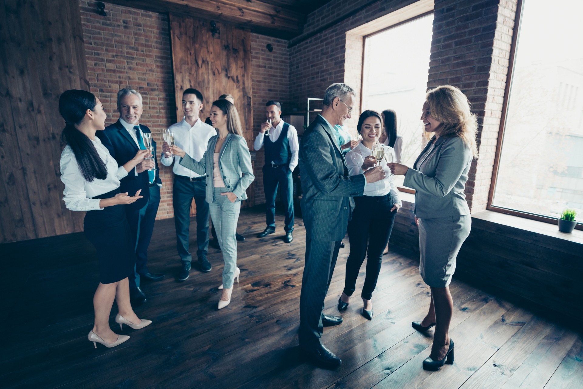 Full length body size photo business people different age race free leisure excited team building members gathering she her he him his golden beverage toasting friendship formal wear jackets shirts